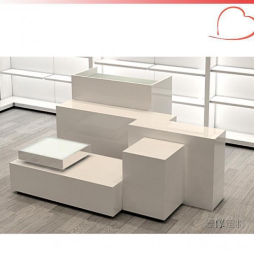 佛山直銷木質(zhì)烤漆展示臺(tái) 童裝陳列臺(tái) 褲子展示柜 服裝陳列桌