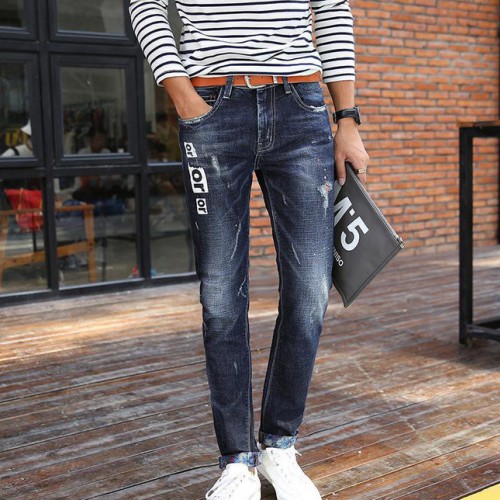 男士小腳褲秋季磨破中腰彈力修身印花學生潮褲卷邊大碼男士牛仔褲